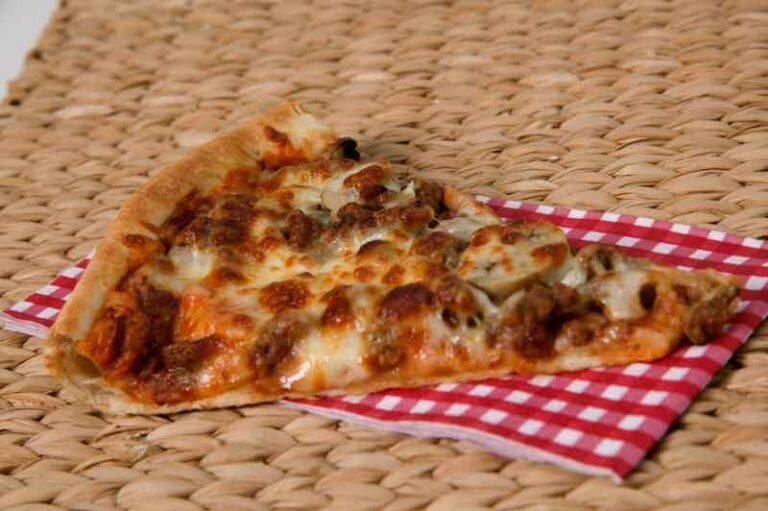Slice of sausage pizza
