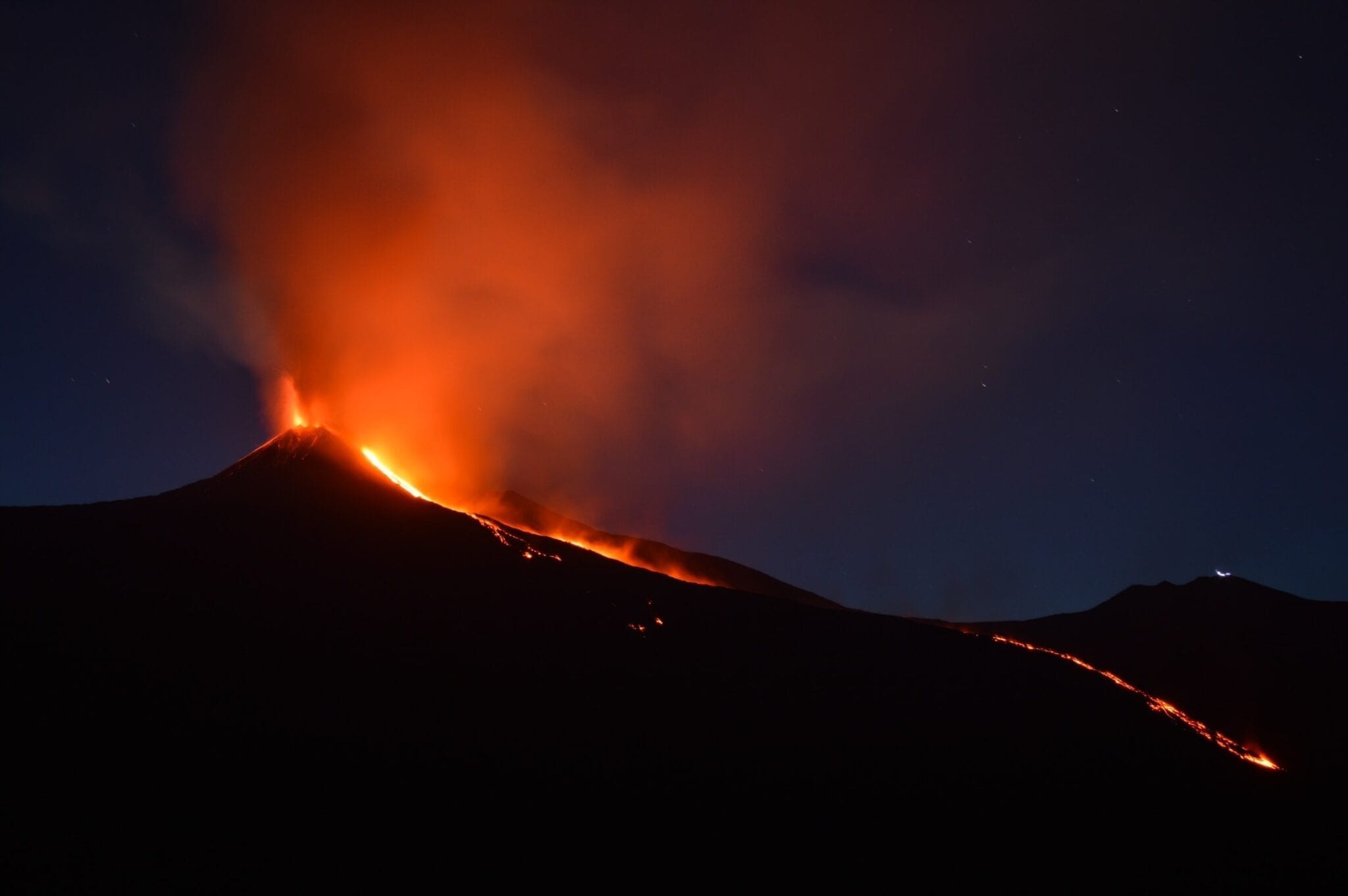 Mount Etna, by Shawn Appel - Unsplash. Volcano erupting in Sicily, Italy