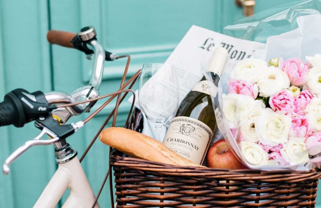 Wine bottle in bike basket, wine shopping