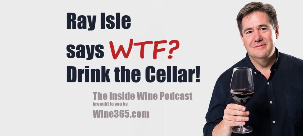 Ray Isle says WTF? Drink the Cellar - man holding glass of red wine