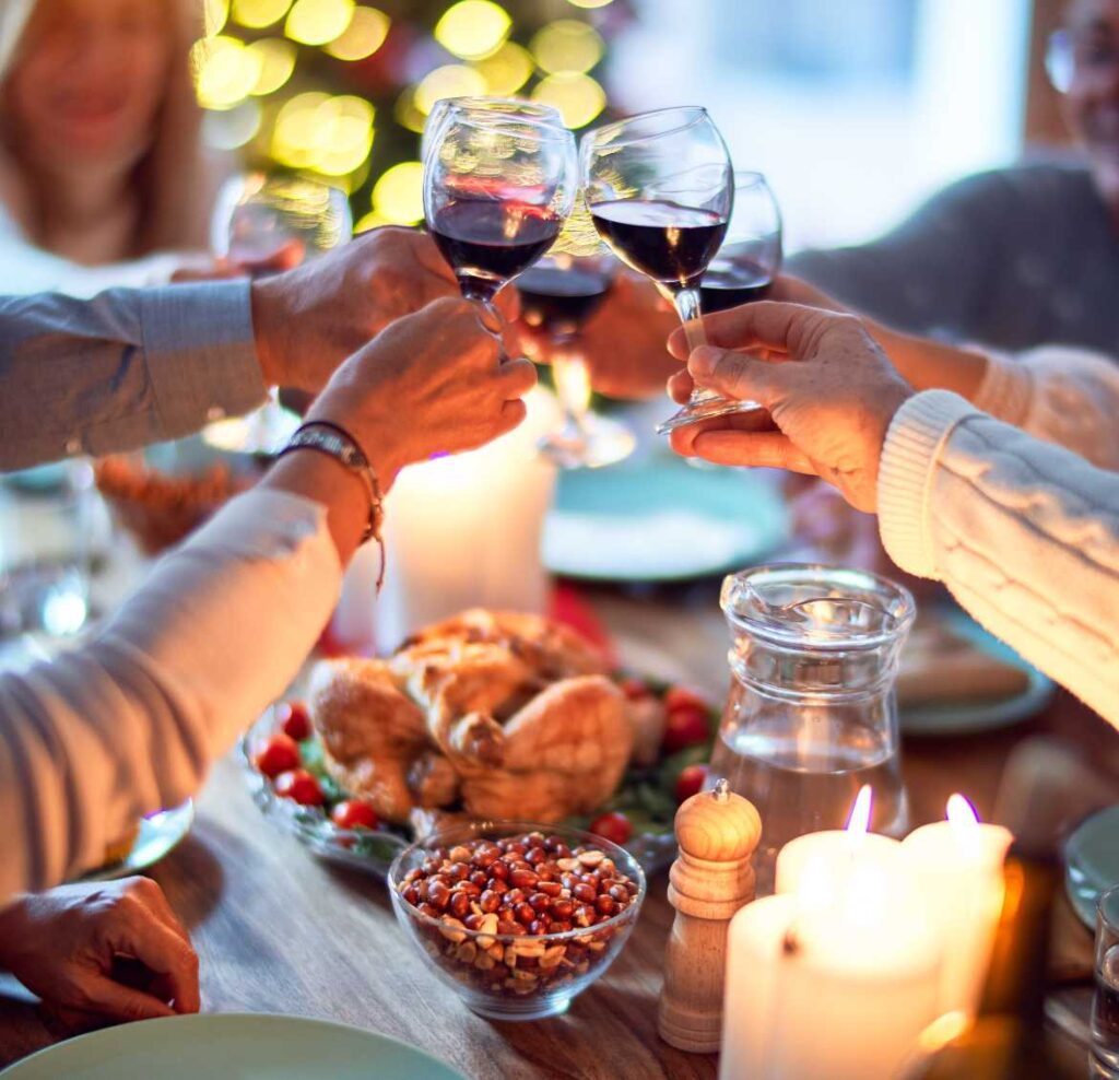 Toasting holiday meal with wine