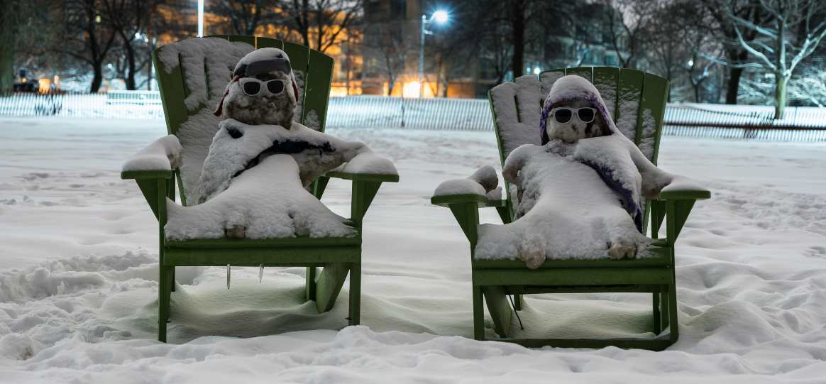 Snowmen in beach chairs
