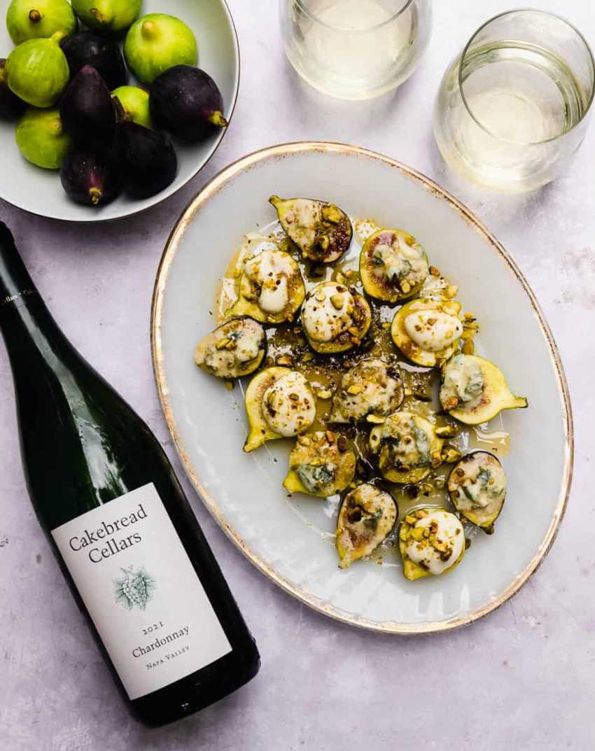 Stuffed baked figs with honey and pistachios, paired with Cakebread Cellars Chardonnay 2